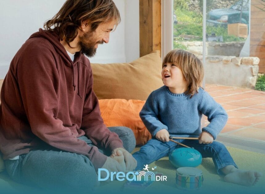 Therapist and autistic boy sit on carpet at home, joyfully playing instruments, smiling, & engaging in playful interaction.