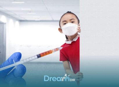 Autistic girl wearing face mask peeking from behind wall near syringe, representing common vaccine concerns and autism.
