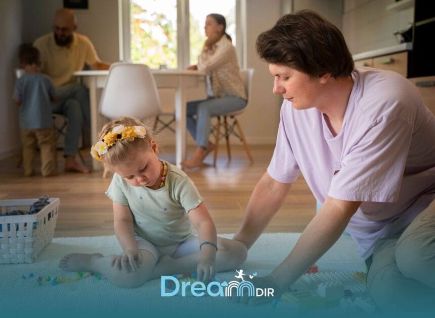 Therapist guiding an autistic girl during floortime therapy with small toys on the floor in New Jersey